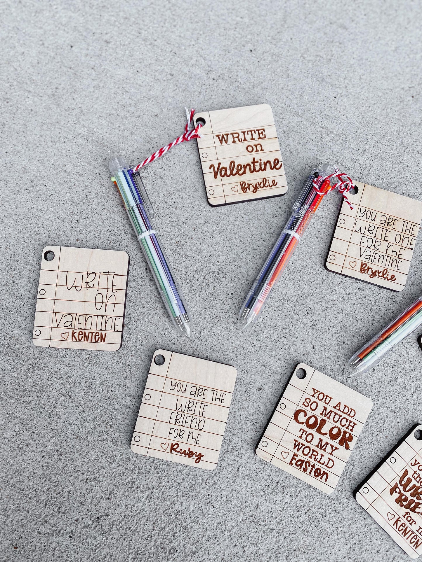 Multicolor pen Valentine cards displayed together for classroom party